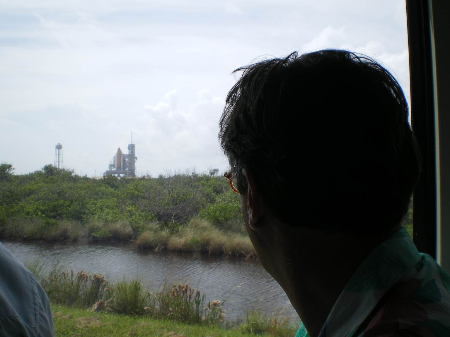 Looking at STS-125 from inside bus