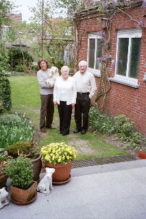 Marc and his parents, in part of the lawn just described